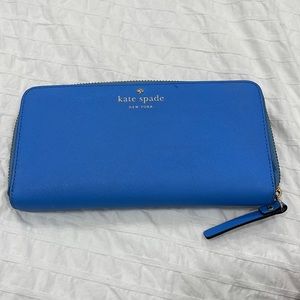 Blue Kate Spade wallet.